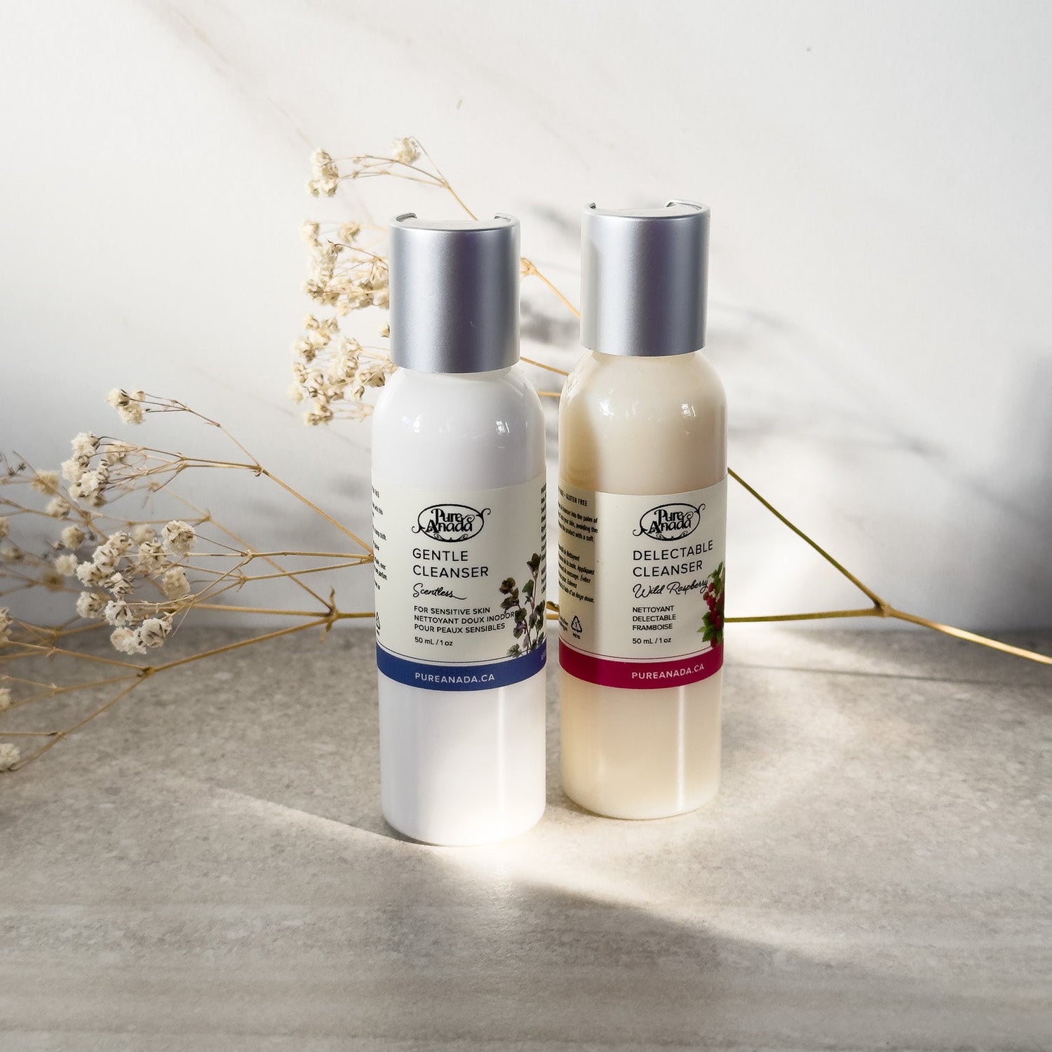 Two bottles of natural Pure Anada face cleanser in two formulas for sesitive skin