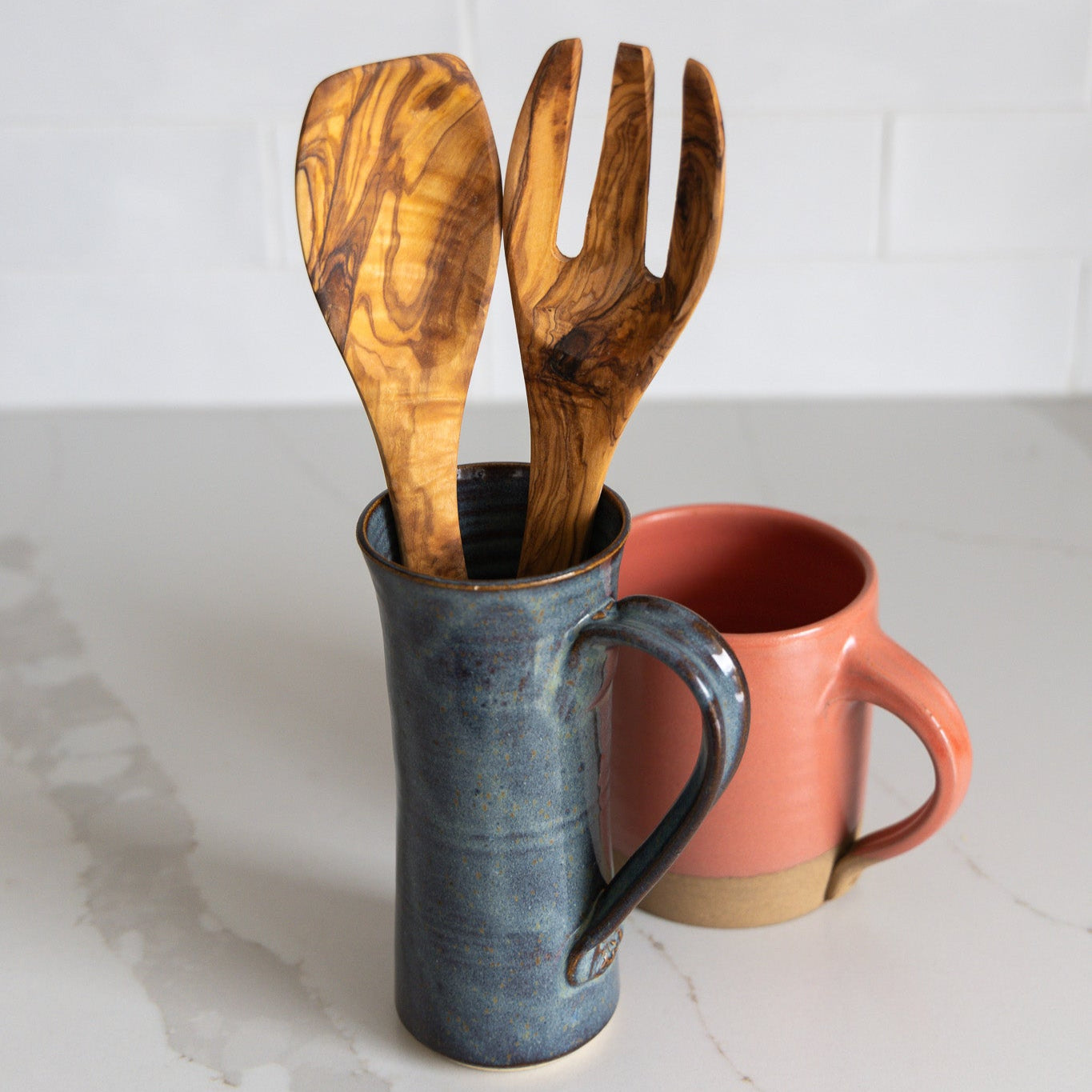 A set of natural olive wood utensils