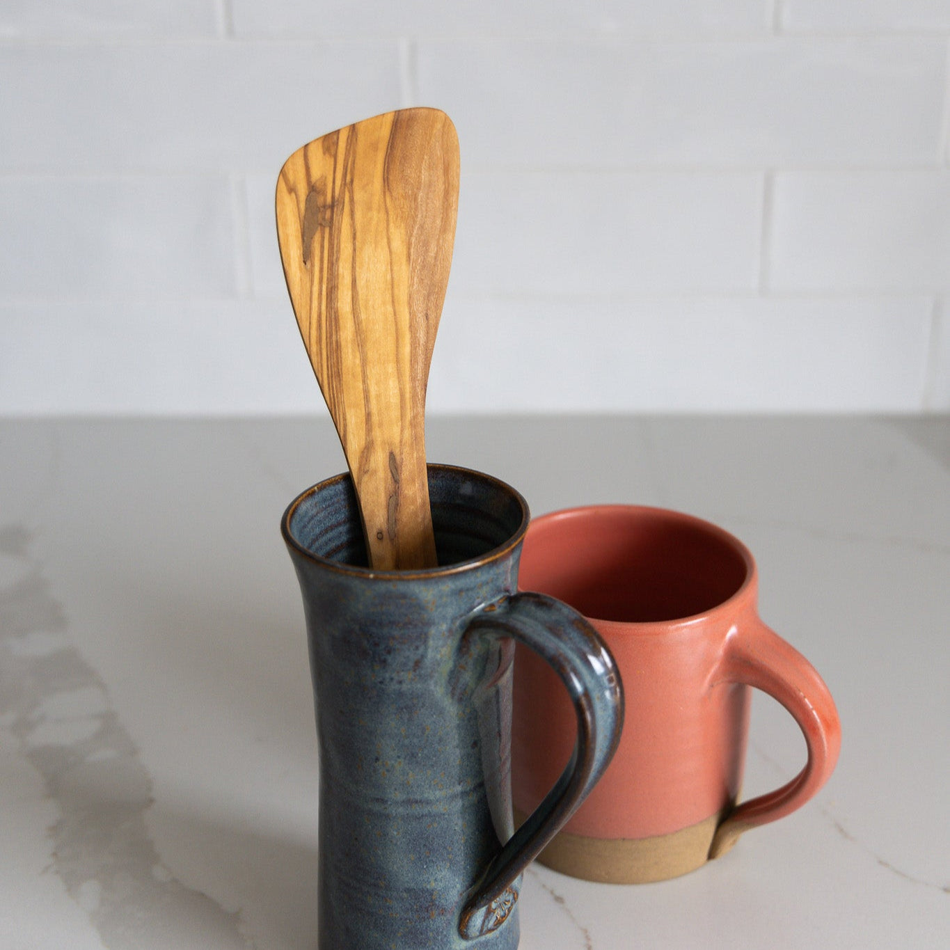 A natural olive wood spatula