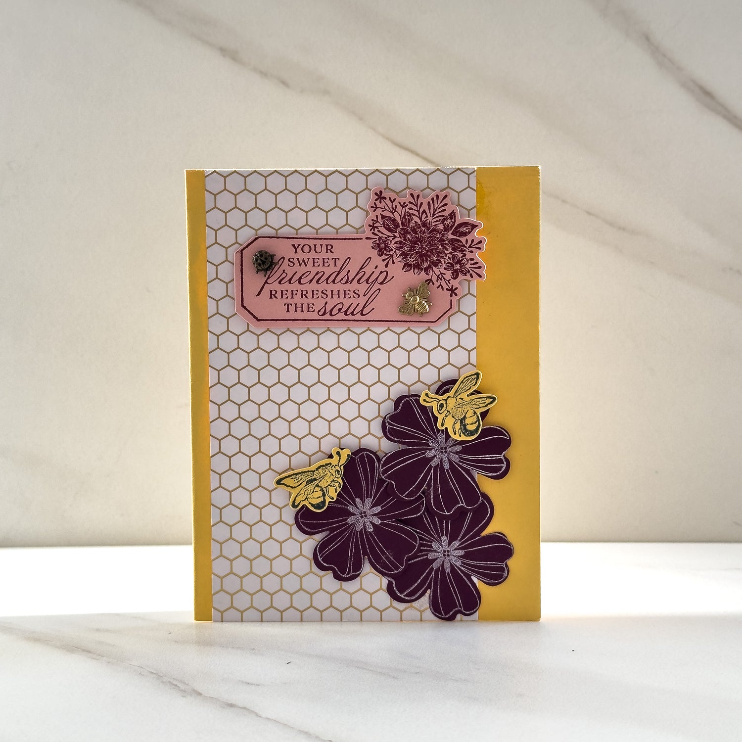 A handmade &quot;friendship&quot; card by Edmonton artist Cassandra Johnson with honeybee motif