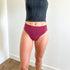 Bluebird thong style period underwear in red shown from the front