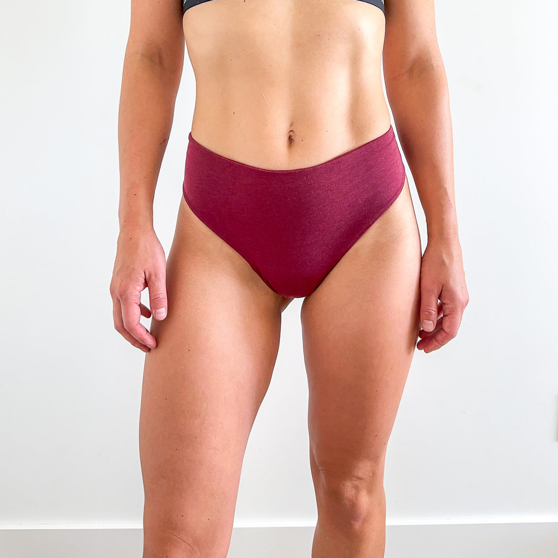 Bluebird thong style period underwear in red shown from the front