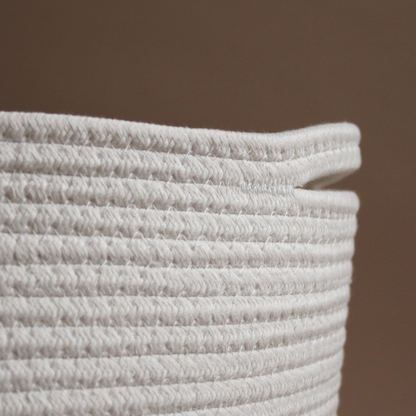 A close-up of a handmade natural cotton basket showing texture 