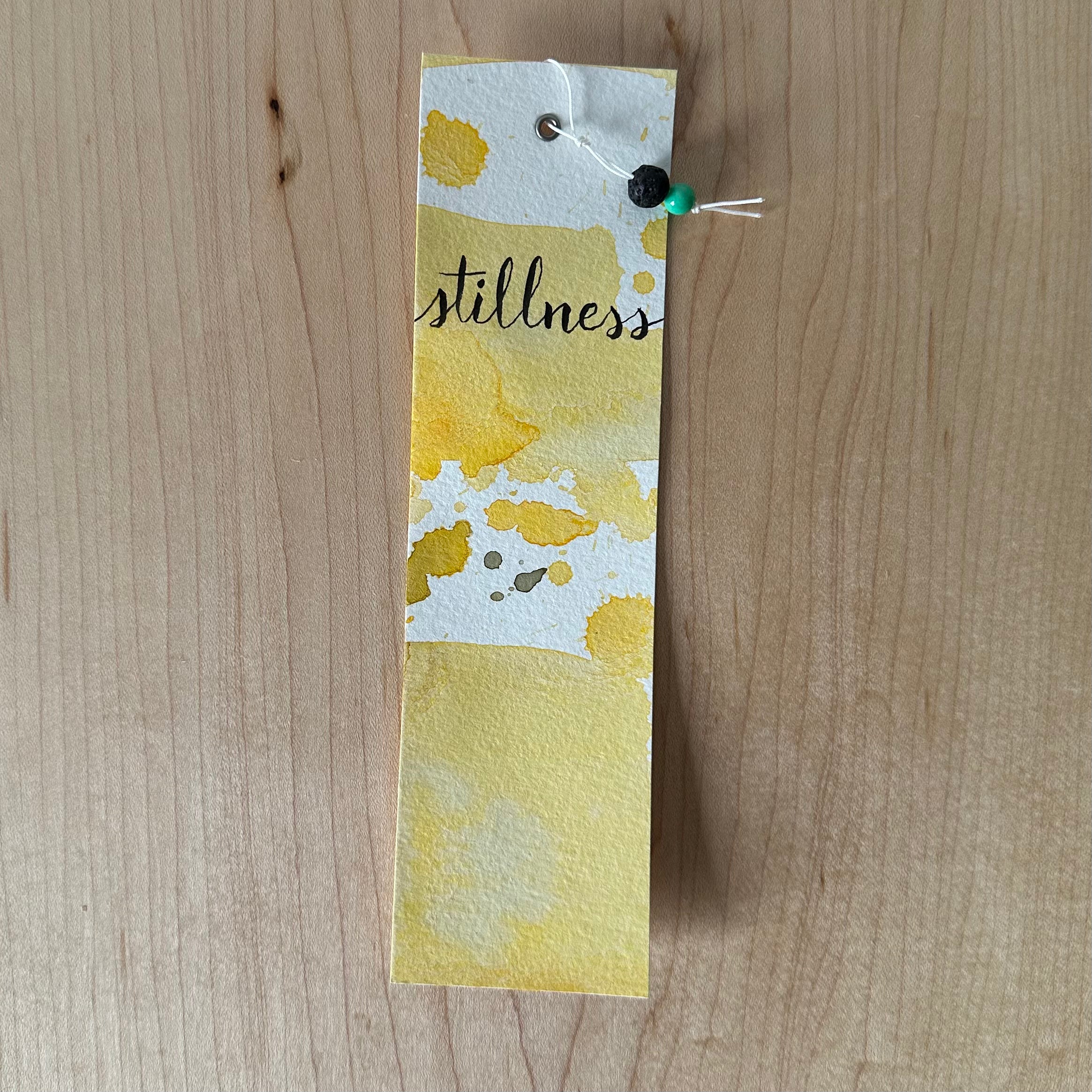 Handmade watercolour bookmark with &quot;stillness&quot; message