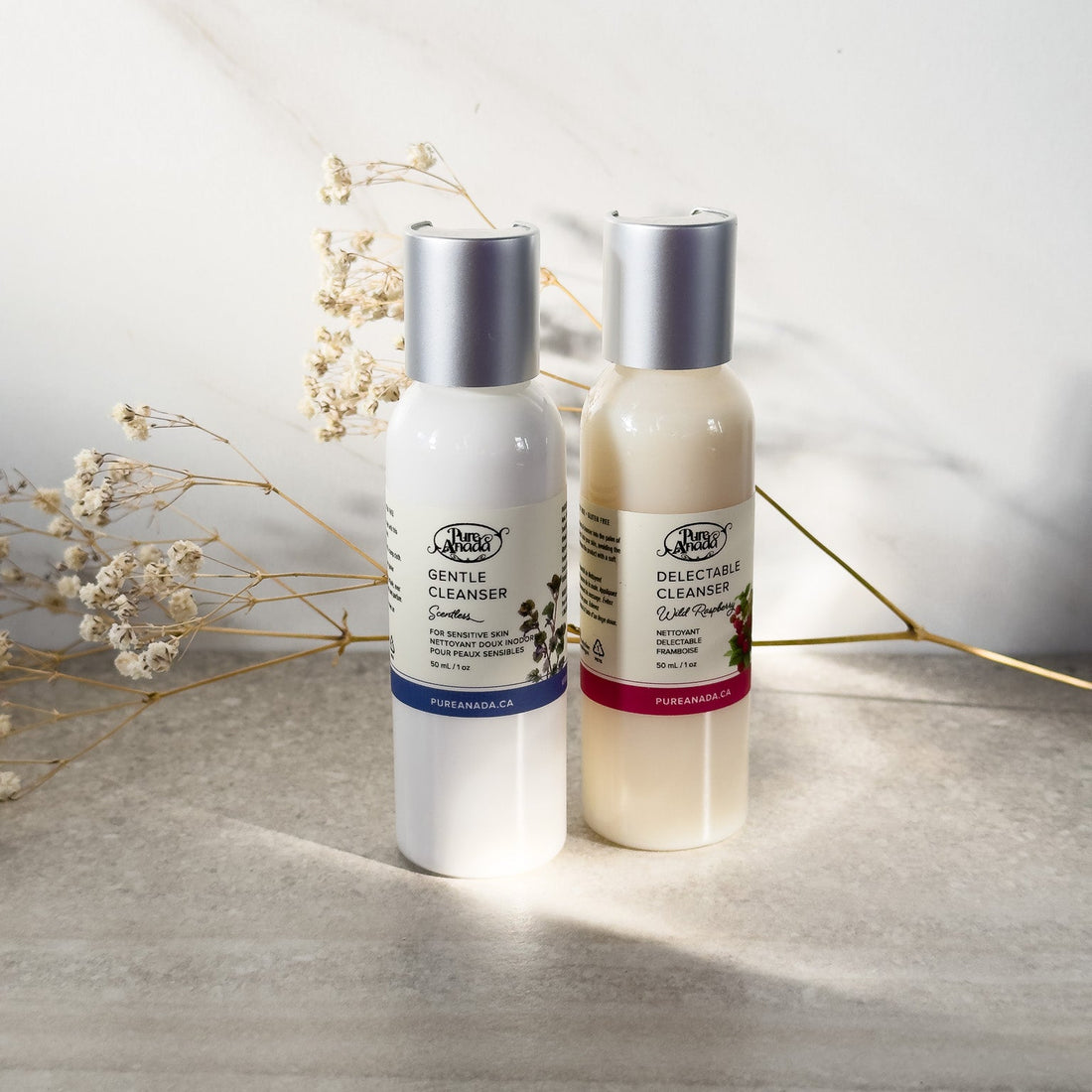 Two bottles of natural Pure Anada face cleanser in two formulas for sesitive skin