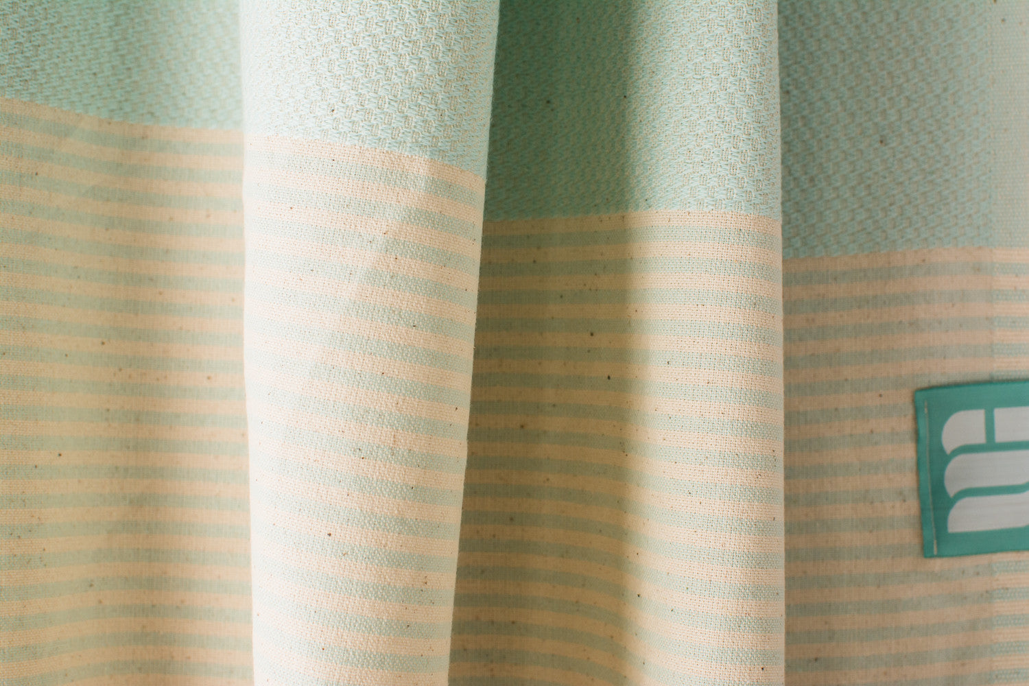 Texture of an aqua Turkish bath towel