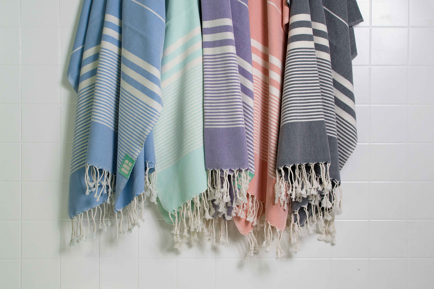 Five lightweight Turkish bath towels in a variety of colours