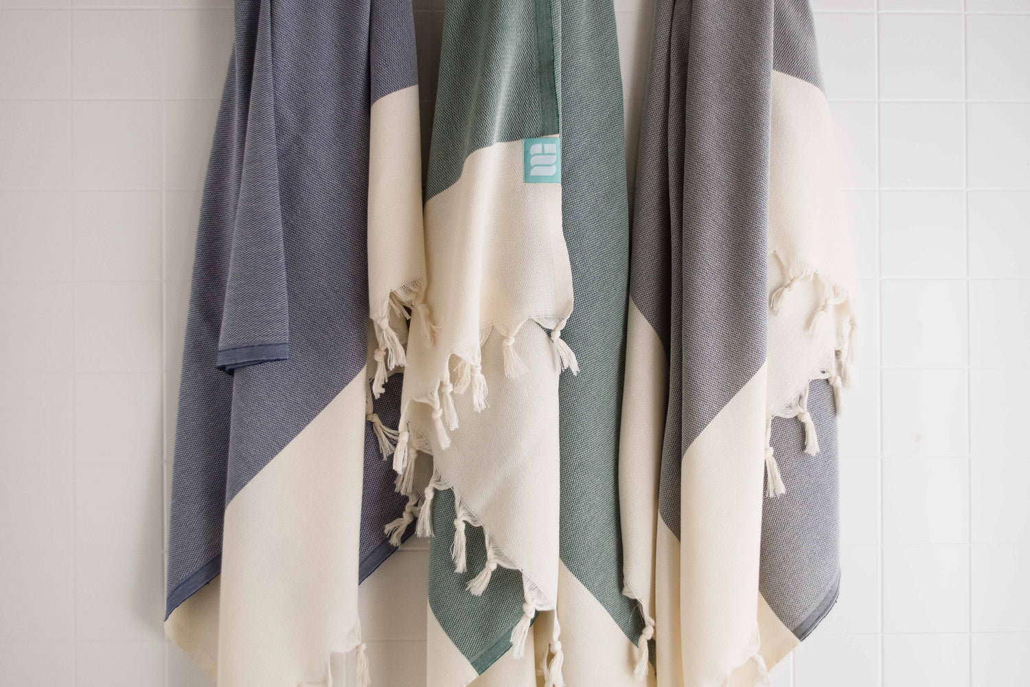 Three Turkish bath towels in a variety of colours