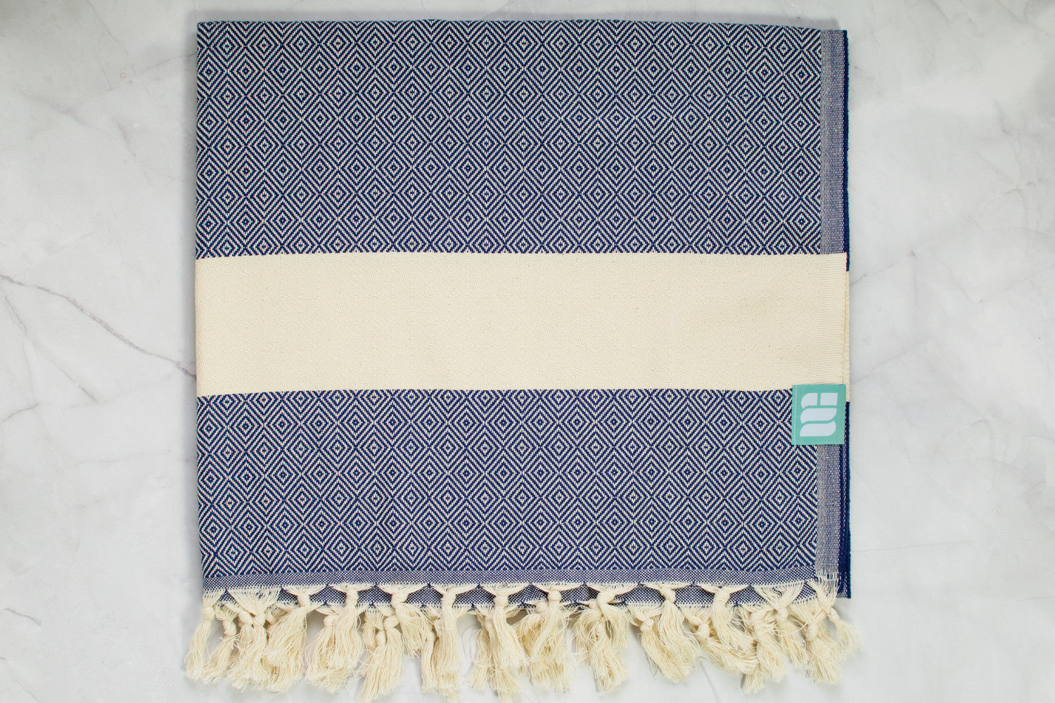 A navy blue heavy weight geometric patterned Turkish bath towel