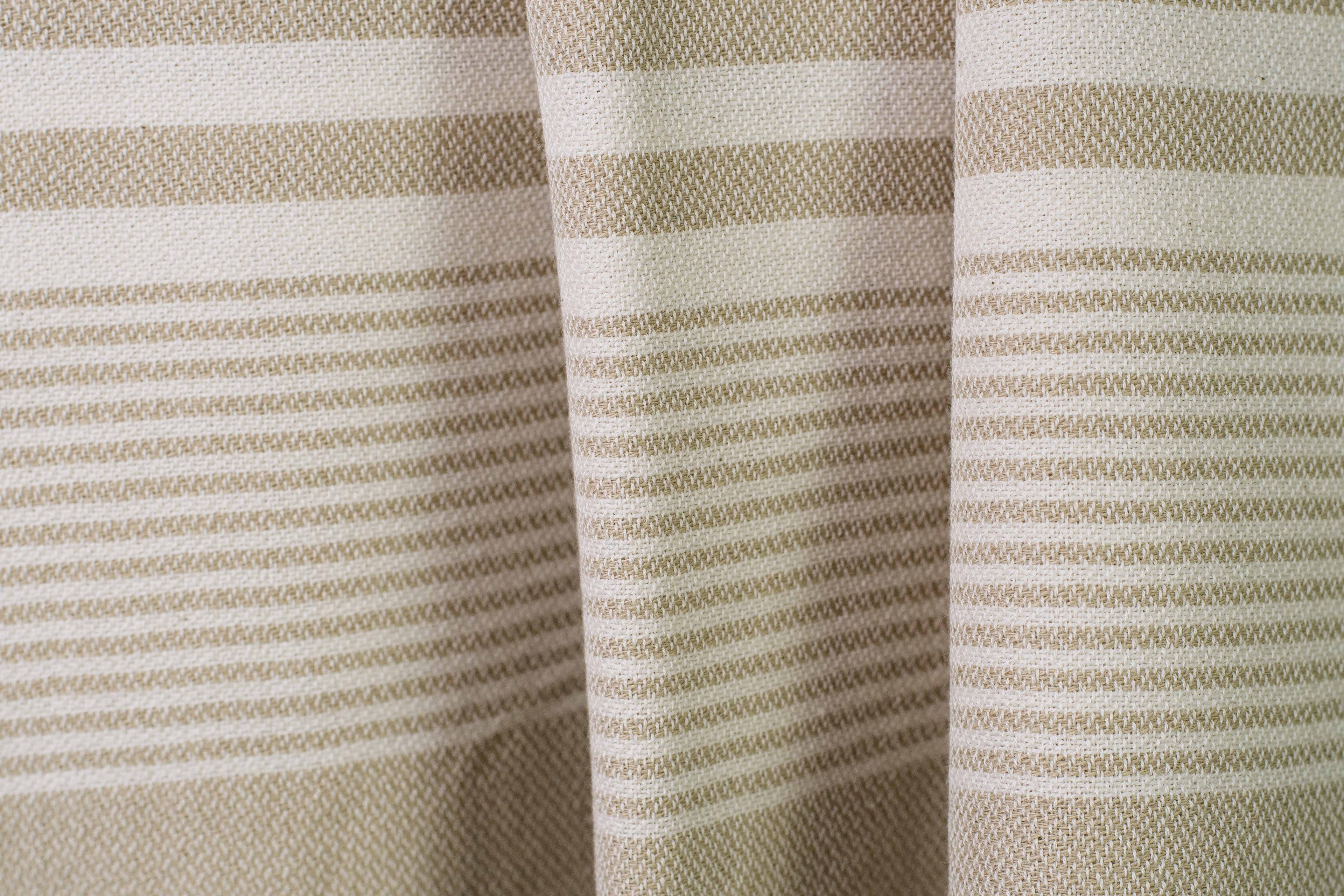 A beige lightweight Turkish hand towel