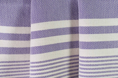 Texture of a purple lightweight Turkish hand towel