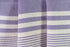 Texture of a purple lightweight Turkish hand towel