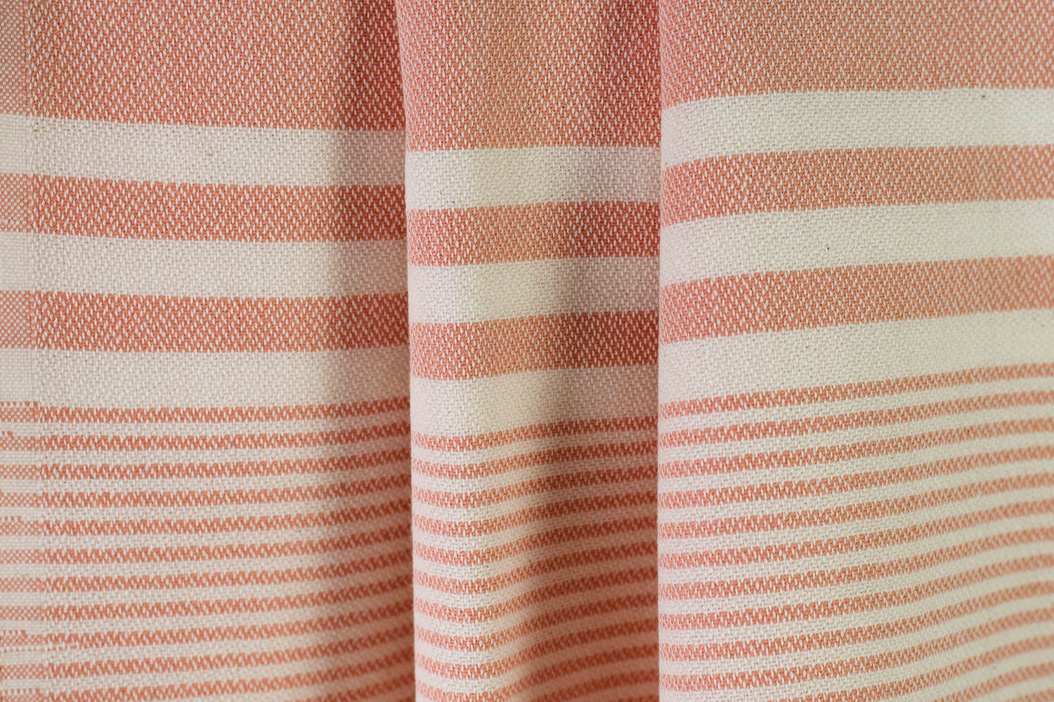 Texture of a salmon lightweight Turkish hand towel