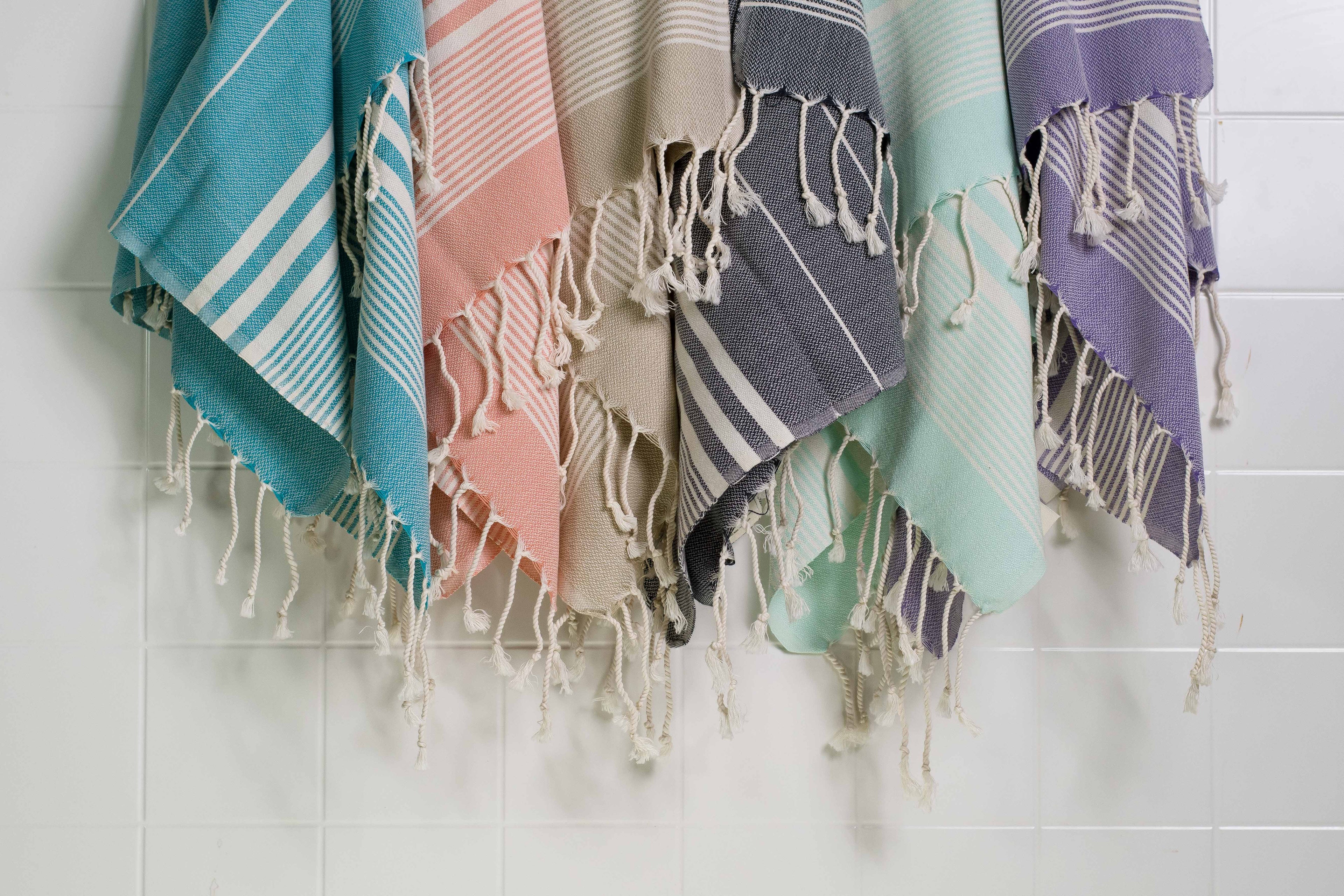 Six lightweight Turkish hand towels in a variety of colours