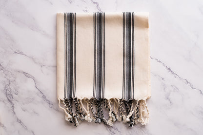 A white and grey natural cotton Turkish hand towel