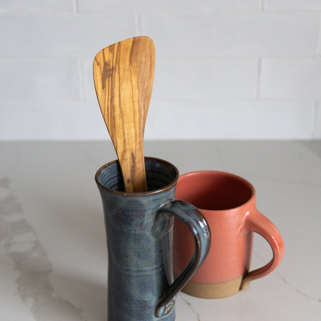 A natural olive wood spatula