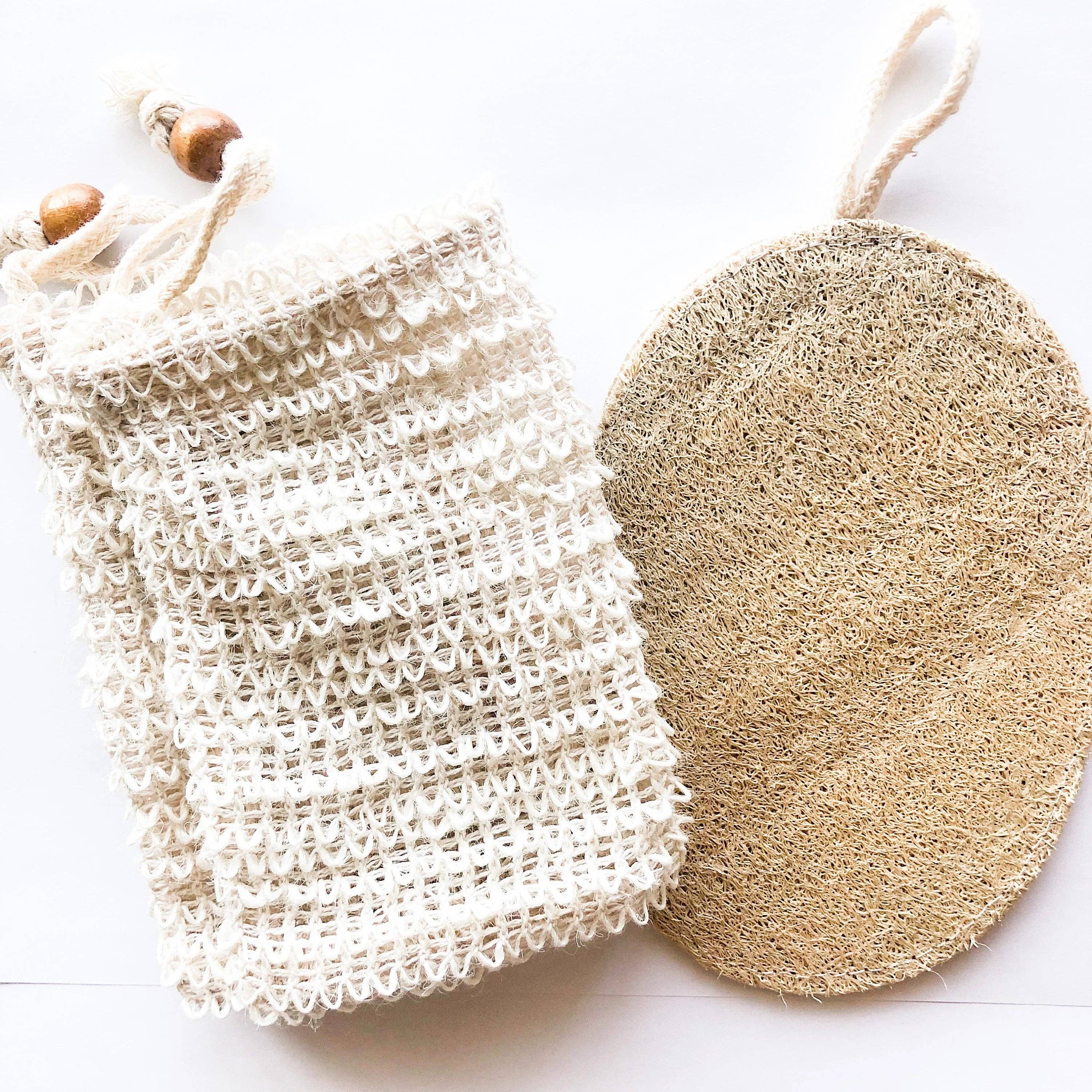 A natural loofah sponge pictured with a scrubbing cloth