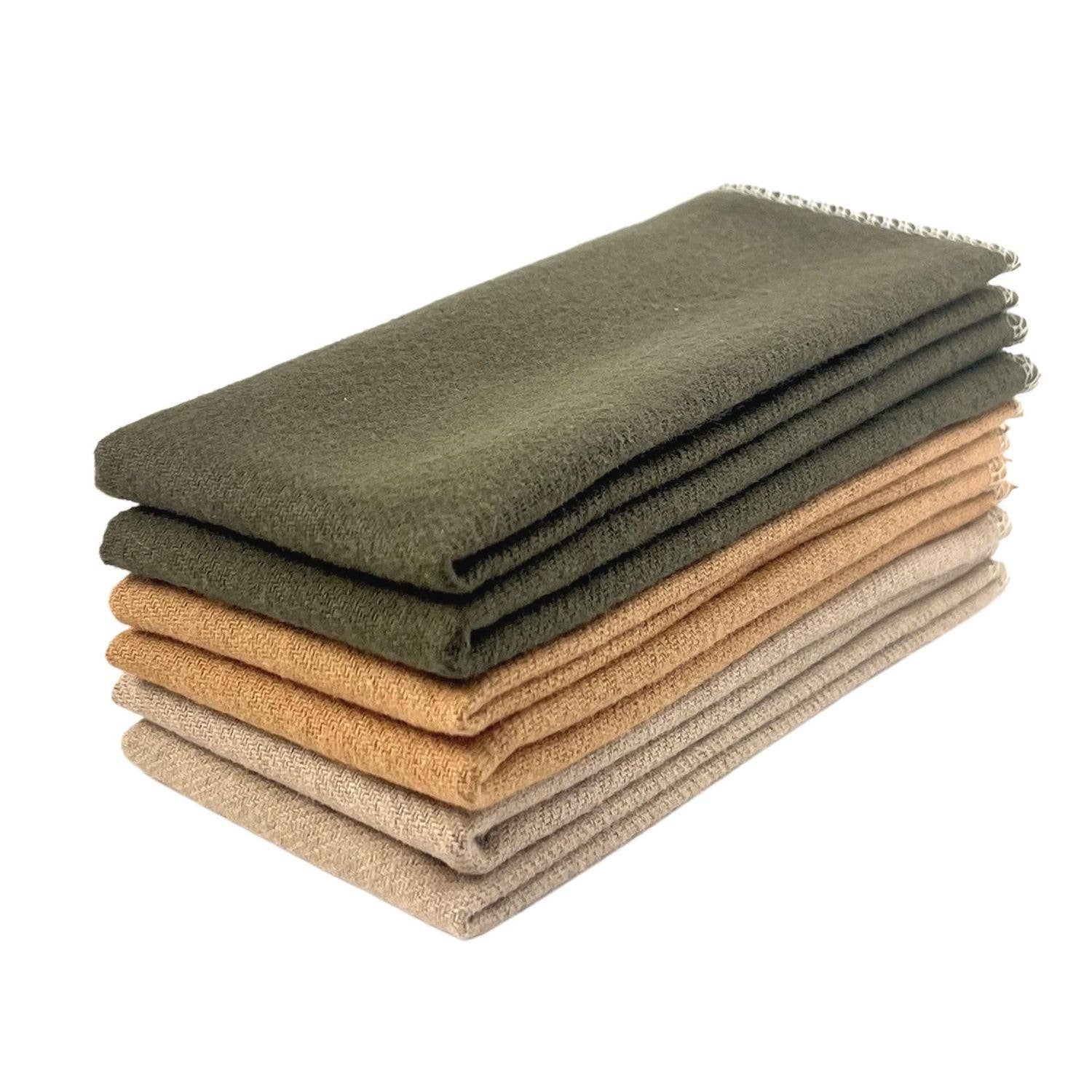 A stack of brushed cotton cleaning cloths in three colours