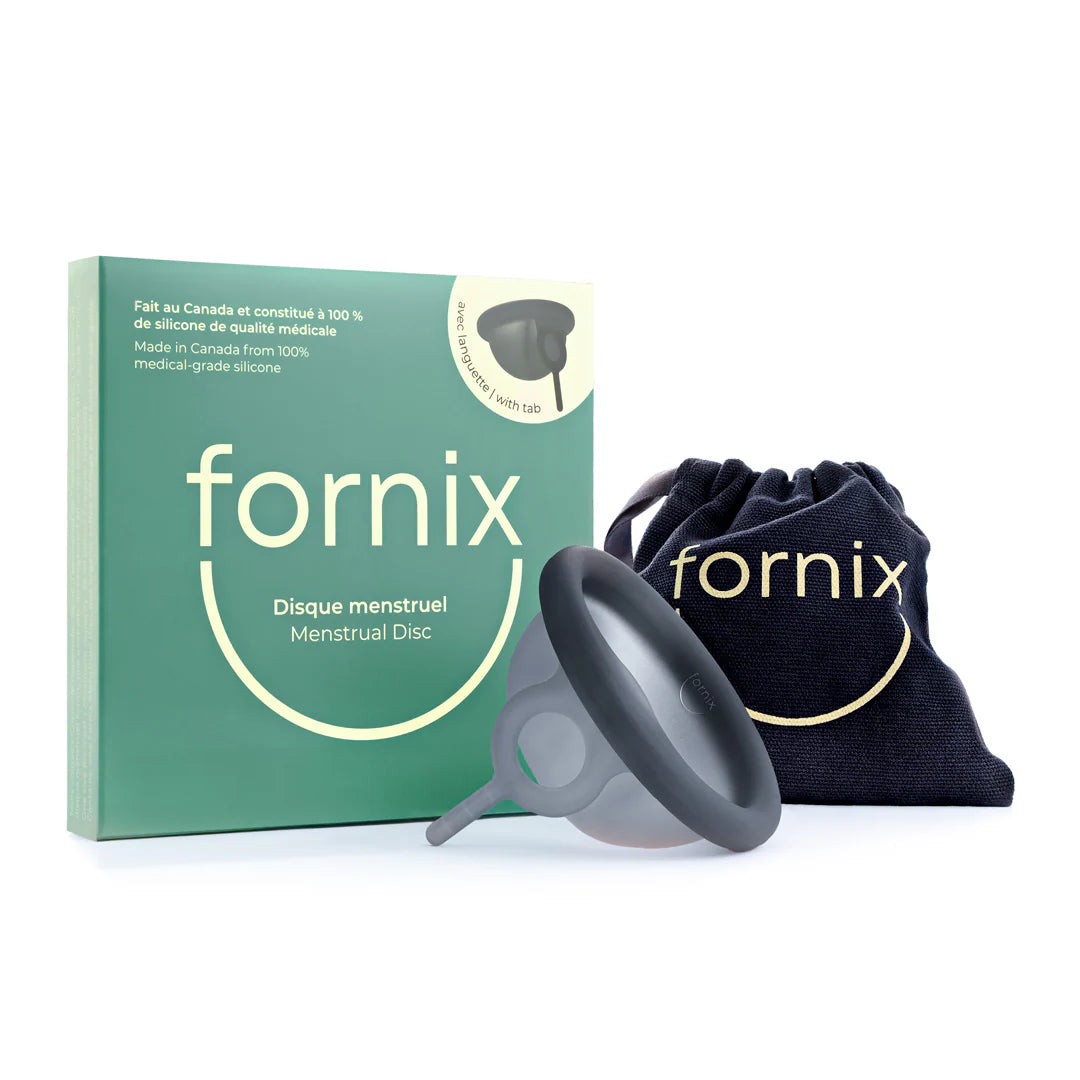 A Fornix menstrual disc pictured with box and storage pouch