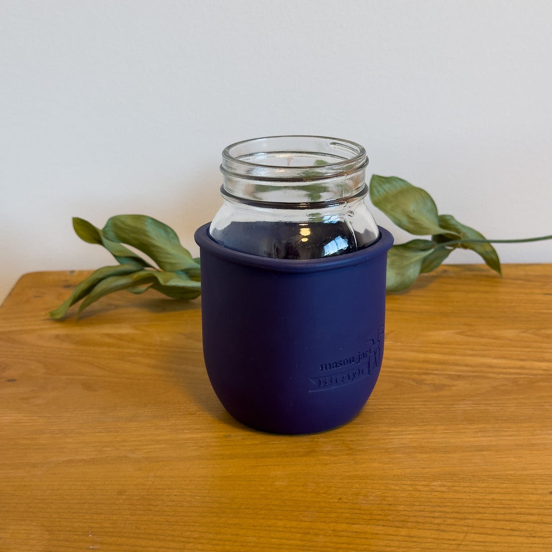 A sustainable silicone sleeve for standard 16oz mason jars
